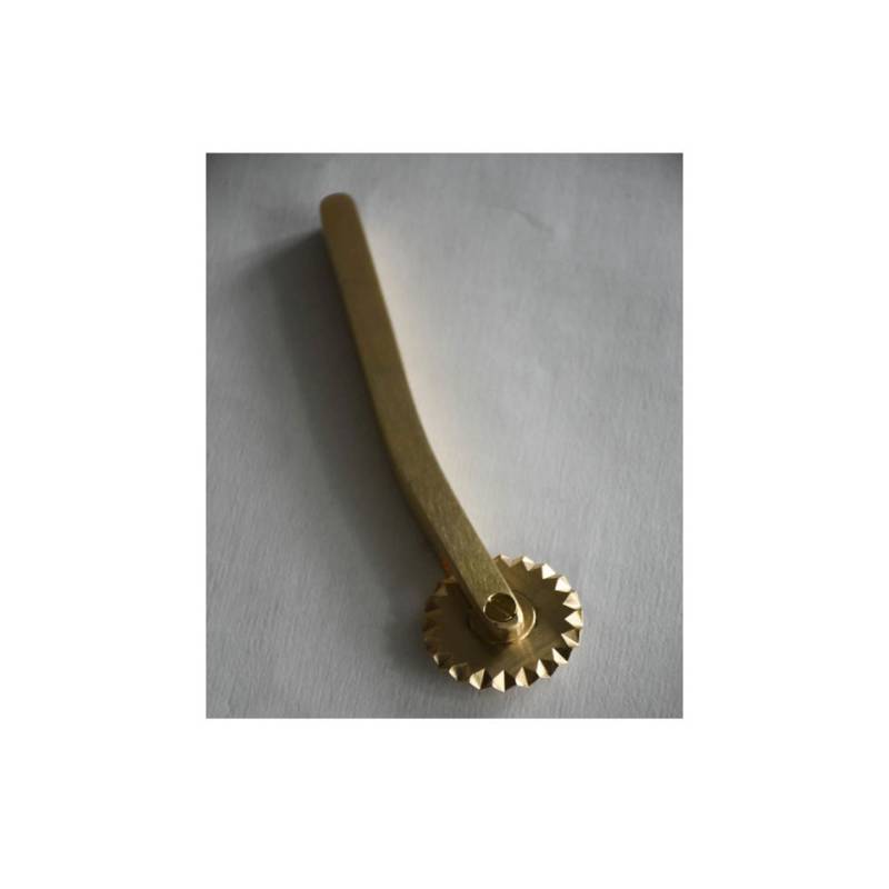 Special brass festooned pastry cutter wheel