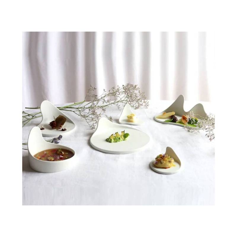 Organic Gochi Uncle appetizer saucer in matt white porcelain 14.5x9.2 cm
